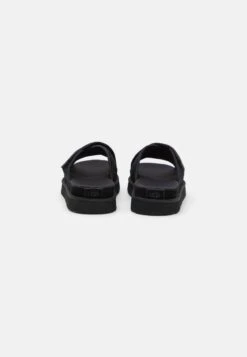 Ugg GoldenstarCross Slide - Muiltjes - Black 9 Ugg GoldenstarCross Slide - Muiltjes - Black -Ugg Verkoopwinkel 98e7d07f00044151ab4ce97cba46247f