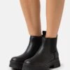 Ugg Ashton Chelsea - Enkellaarsjes Met Plateauzool - Black 1 Ugg Ashton Chelsea - Enkellaarsjes Met Plateauzool - Black -Ugg Verkoopwinkel faf17284b6a4465a864f92f54c2746c2